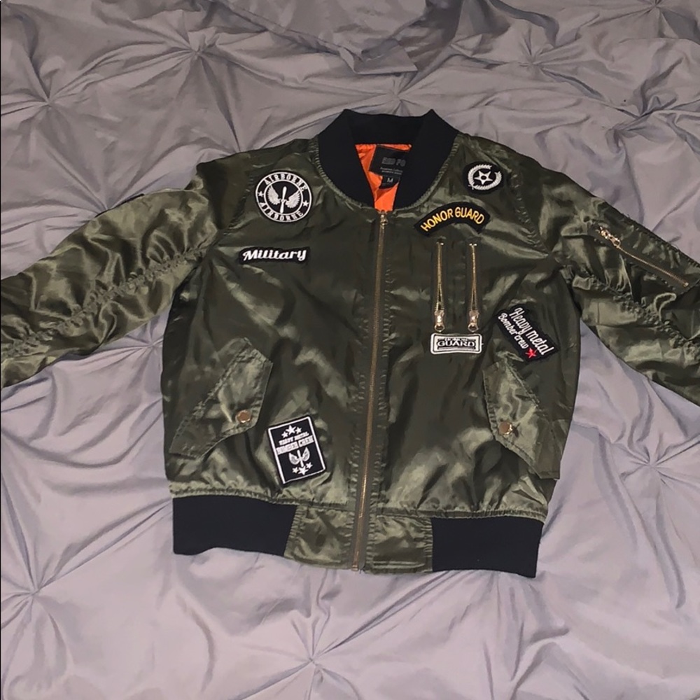 A navy green bomber jacket